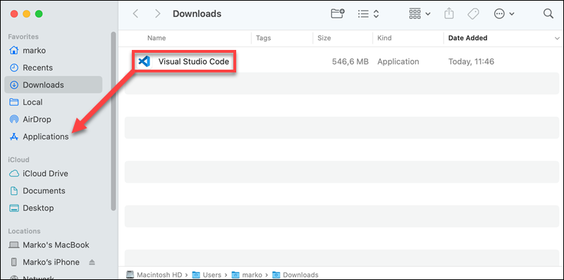 Dragging the VS Code app into the Applications directory.